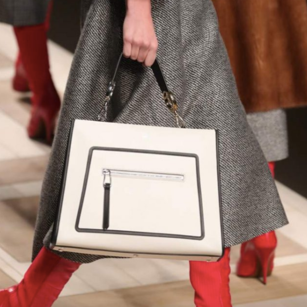 THE STORY BEHIND HANDBAGS AND HOW THEY REPRESENT US